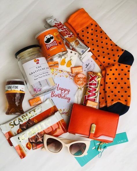 Greeting cards, Gratitude Jars, Gift Packages on Instagram: "For The Love Of Orange Gift pack. 🧡🧡🧡🧡🧡🧡 This gift combo is only 150k WhatsApp 0784612417 to order for your loved one. #TheFineLot ------------------------------ #gift #orange #orangeaesthetic #orangegift #gratitudejar #happysocks #pringles #wine #giftideasuganda #orange🍊 #aesthetic #birthdaygift #happybirthday #gwangamujje #kampala #uganda #giftboxes #treatsforme #sweet #sweettooth #gainwithxtiandela #roastandrhyme #socks #smal Orange Gift Basket Ideas, Orange Gift Basket, Gratitude Jars, Orange Gifts, Intentional Gifts, Gratitude Jar, Orange Birthday, Mom Gift Basket, Kampala Uganda