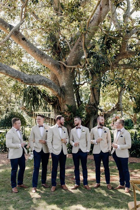 How nice are all these groomsmen in matching beige jackets, navy pants and a tan shoe! The perfect mixture between modern and classic. Men’s Wedding Party Attire, Bush Wedding Groomsmen, Country Style Wedding Mens Attire, Groomens Attire Rustic, Groom Groomsmen Attire, Mens Wedding Suits Rustic, Rustic Wedding Mens Attire, Rustic Mens Wedding Attire, Grooms Party Attire