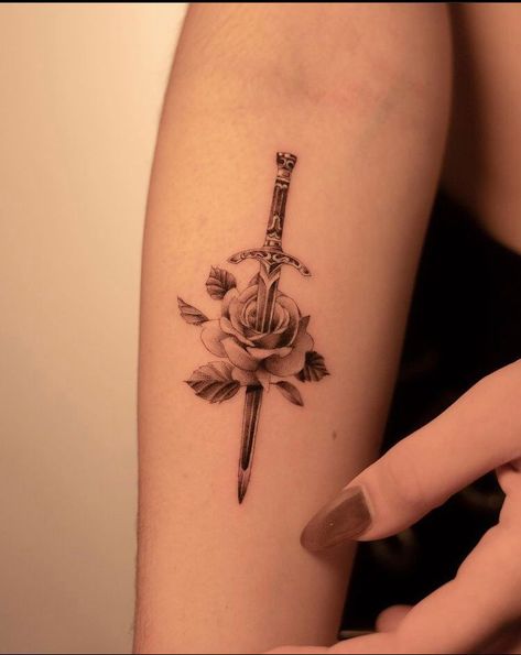 Rose With Swords Tattoo, Rose Thorn Tattoo, Knife And Rose Tattoo, Feather Tattoo For Men, Rose Chest Tattoo, Nefertiti Tattoo, Tattoos For Dad Memorial, Band Tattoos For Men, Single Rose Tattoos