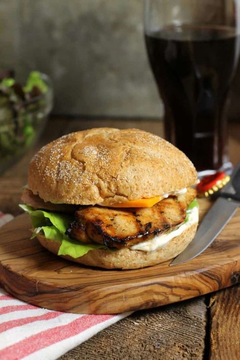 These marinated grilled chicken burgers are juicy, tender and full of flavor. Perfect for a weeknight summer meal or BBQ. #bbq #chickenburgers #marinatedchicken #chickenbreastburger #grilledchicken Grilled Chicken Burgers, Grilled Chicken Marinade, Grill Chicken, Grilled Bbq Chicken, Bruschetta Ingredients, Top Chicken Recipes, Burger Toppings, Chicken Burger, Summer Meal