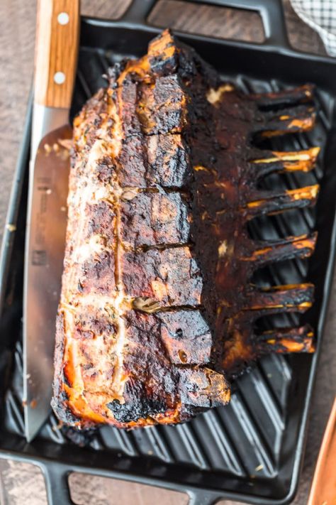 pork roast lying on a baking pan with a carving knife Pork Crown Roast Recipe, Whiskey Glaze Recipe, Crown Roast Recipe, Pork Crown Roast, Crown Roast Of Pork, Crown Roast, Whiskey Glaze, Bacon Mashed Potatoes, Creamy Garlic Mushrooms