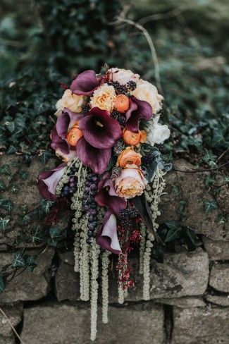 Lovely cascading bouquet for a Medieval Castle Wedding in Northern Ireland Orange Purple Wedding, Deep Purple Wedding, Orange Wedding Bouquet, Dragon Wedding, Cascading Bouquet, Burnt Orange Weddings, Medieval Wedding, Belle Isle, Cascade Bouquet