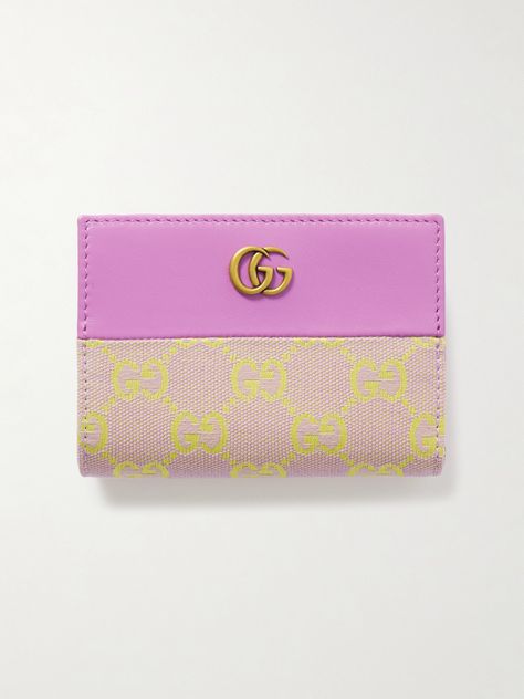 Gucci's wallet has been made in Italy from a combination of canvas-jacquard woven with the brand's iconic 'GG' monogram and smooth leather in a summery pink and yellow colorway. It has numerous slots for storing your cards and cash. Cute Card Wallet, Cute Designer Wallets, Gucci Designer Wallets With Logo, Designer Gucci Wallets With Logo, Luxury Gucci Wallet With Logo, Luxury Gucci Wallets With Interior Card Slots, Gucci Travel Wallets With Card Slots, Gucci Wallets With Card Slots For Travel, Designer Rectangular Wallets With Logo