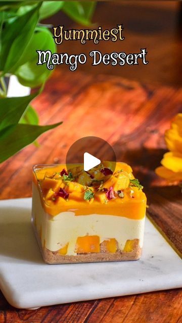 Neelam Agarwal | Vegetarian Food & Recipes on Instagram: "Indulge in guilt-free - Mango Bliss Cheesecake – made with creamy hung curd,  yummy mango, and just a hint of sweetness. Health-conscious never tasted so good!  For the filling we need: 🔹Hung curd - 1 cup 🔹Ripe mangoes - 1 cup (cut into small pieces) 🔹Sugar - 1 to 2 tsp (use any sweatner of your choice) 🔹Lemon zest  🔹Mango Puree - 1/2 cup (simply blitz 1 mango with 1tsbp water) 🔹Biscuit crumble - 1 small digestive or sweet biscuit packet + 1 to 2 tsp butter (crush the biscuits and add butter to it. Mix well and keep aside) 🔹For garnish - Mangoes, mint leaves and pistachios   First step - Add mangoes, hung curd and sugar in mixer jar and blitz it to a fine thick paste ( do not add any water)  Now let's layer the dessert box or Hung Curd Recipes, Mango Puree Recipe, Vegetarian Food Recipes, Mango Curd, Vegetarian Appetizer, Dessert Box, Bottle Cake, Mango Dessert, Curd Recipe