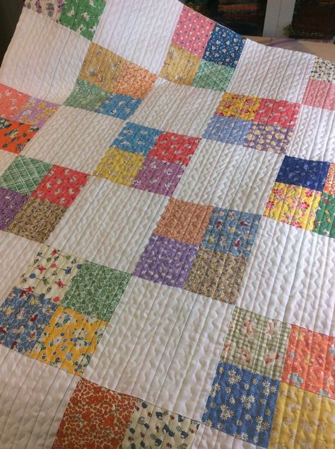 A pretty quilt made for charity.  Love the quilt stitching!  | Mama Spark's World Quick And Easy Quilts Simple, Sew Fresh Quilt Patterns, Quilts Made From Charm Squares, Quilt Patterns For Busy Fabric, 4 Patch Quilt Patterns Free, Fast Quilts To Make, 4 Square Quilt Pattern, Simple Quilts Patterns, Old Fashioned Quilts