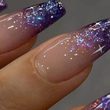 Sweetie Nail Supply on Instagram: "We are obsessed with the latest DVOK December collection! Keep your eyes peeled for another tutorial on how to achieve this dreamy starry night look. Every collection comes with 10 glitter gel polishes and 2 packs of decoration stones as a gift! Selling fast, you don’t want to miss this one of a kind set! 🏃‍♀️💨 HEMA-free, 13-free Shop now at www.sweetienailsupply.com For inquiries please contact us through email at sales@sweetienailsupply.com 👍 #hemafree #nailset #naillook #gelnails #gelnailsdesign #nailinspo #nailinspiration #nailart #nailaddict #nailreel #starrynails #nailtrends #nailsoninstagram #nailvideo" Under The Stars Nail Ideas, Sparkly Purple Nail Designs, Starry Night Prom Nails, Starry Nail Art, Prom Nails Stars, Star Night Nails, Twinkle Nail Art, Galaxy French Tip Nails, Starry Night Nails Acrylic