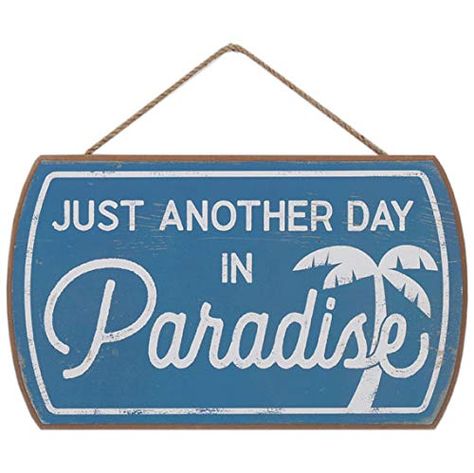 PRICES MAY VARY. Open Road Brands official product: Paradise is wherever your people are! Use this lovely blue sign to add a nautical touch to your home. Fun Vintage Sign: With a sweet palm tree illustration and stylish typography, this wall art is a must-have addition to your other beach-themed decor. Material: This must-have wall decor is made of MDF wood with a string for quick and easy display. Made in the USA. Places to Use: This simple but commanding sign will make a statement in your beac Beach House Names, Beachy Living Room, Just Another Day In Paradise, Beach Signs Wooden, Plain Wall, Ocean Tropical, House Lake, Another Day In Paradise, House Names