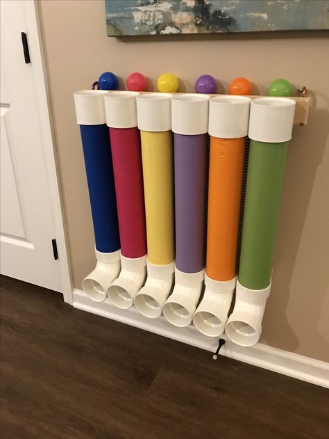 DIY kids ball drop toy made from PVC pipes and fabric. Diy Ball Drop, Prek Activities, Baby Room Diy, Baby Toys Diy, Toddler Classroom, Activity Center, Diy Kids Toys, Center Ideas, Ball Drop