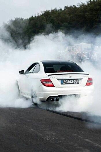 Burning some rubber... Mercedes C63 Amg Wallpaper, Cars Burnout, Car Burnout, Mercedes Sport, Mercedes Benz Wallpaper, Cool Truck Accessories, Mercedes C63 Amg, C 63 Amg, Mercedes Benz C63 Amg