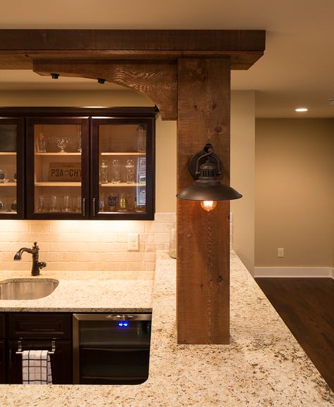 How To Hide Support Beams In Basement, Support Beam In Kitchen Island, Kitchen Support Beam, Kitchen With Beam Support, Wrap Around Bar, Oak Wrapped Beams, Basement Bar With Support Post, Basement Bar Around Support Beam, Kitchen With Support Beams & Island