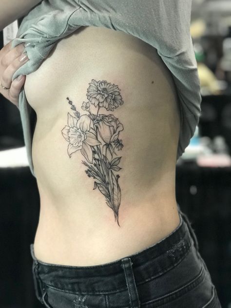 Floral piece by @isaidgoddam  #floraltattoo #daffodil #marigold #rose Rose Daffodil Aster Tattoo, Marigold Rose Tattoo, Daffodil Rose Poppy Tattoo, Narcissus And Rose Tattoo, Marigold And Gladiolus Flower Tattoo, Marigold Daffodil Tattoo, Daffodil And Rose Tattoo Birth Flowers, Rose Daffodil Chrysanthemum Tattoo, October And June Birth Flower Tattoo