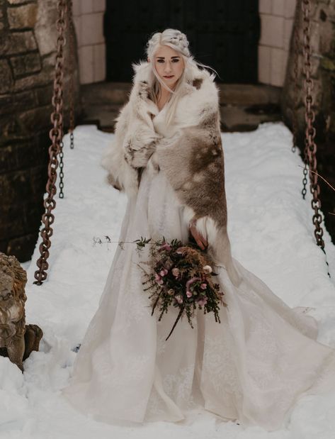 A Marriage of Ice and Fire: The Game of Thrones-Inspired Wedding You've Got to See to Believe - Green Wedding Shoes Khaleesi Wedding Dress, Viking Wedding Dress Winter, Viking Wedding Winter, Viking Wedding Shoes, Winter Viking Wedding Ideas, Wedding Dresses Viking Style, Viking Bride Dress, Viking Wedding Ideas Dresses, Viking Inspired Wedding Dress