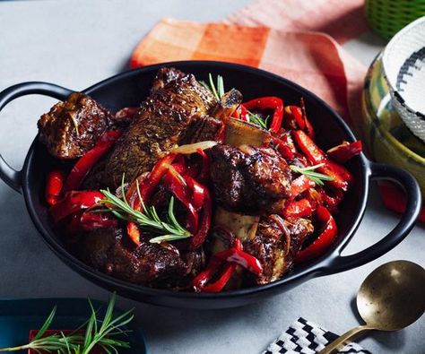 Ribs, slowly braised with berbere spice, with the gentle sweetness of capsicums – there's nothing better. Braised Beef Recipes, Roasted Carrot Salad, Capsicum Recipes, Berbere Spice, Roasted Capsicum, Easy Summer Dinners, Ethiopian Food, Braised Beef, Beef Short Ribs