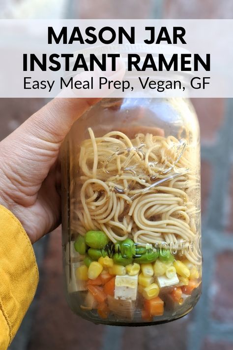 This mason jar ramen recipe is an easy and satisfying lunch!  More flavorful than Instant Ramen, this soup will fill you up with healthy vegetables without the salt.  Just add hot water, and you have a delish and filling lunch at home or at the office!This  Mason Jar Ramen Is:  Light  Filling  Low Sodium (yikes, have you ever checked out the sodium content of the packaged stuff?!)  Noodley  Vegan  Gluten Free (if using rice noodles)  Versatile – swap out any veggies.  EASY to Meal Prep Ramen Noodle Jar Recipes, Gluten Free Meals In A Jar, Lunch Meal Prep Soup, Vegan Jar Meals, Mason Jar Instant Soup Recipes, Gluten Free Jar Recipes, Ramen In A Jar Recipes, Healthy Jar Meals, Ramen Jar Recipes