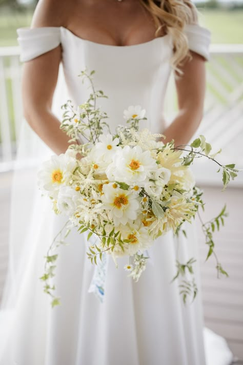 Luscious White and Yellow Bride Bouquet With Pops of Color and Cascading Greenery   #whiteandyellowbouquet #whitebouquet #yellowbouquet #wildflowerbouquet #lushbouquet Yellow Bride Bouquet, Yellow Bride, Yellow White Wedding, Whimsical Bouquet, Yellow Bridal Bouquets, Yellow Wedding Bouquet, Small Wedding Bouquets, Yellow Wedding Theme, Yellow Wedding Flowers