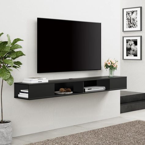 PRICES MAY VARY. 【LARGE STORAGE 】70" W x 11.8" D x 10.5" H .This floating tv console is perfect for DVD player, CDs, projector cable box, game console, TV component and decorations,side compartments provide additional storage. 【SPACE SAVING】Wall mounted console shelf,Keep the floor space under your television clear by storing TV equipment on the media console's wall mounted shelves.Cable Holes for hiding messy wires keeping your stuff neatly organized and within reach! 【Wire Management System】Th Black Floating Shelves Tv Wall, Tv Wall Mount Ideas Bedroom Small Spaces, Under Tv Shelf, Under Tv Decor, Entertainment Center Wall, Floating Shelves Tv Wall, Tv On Wall, Shelf Under Tv, Floating Shelf Under Tv