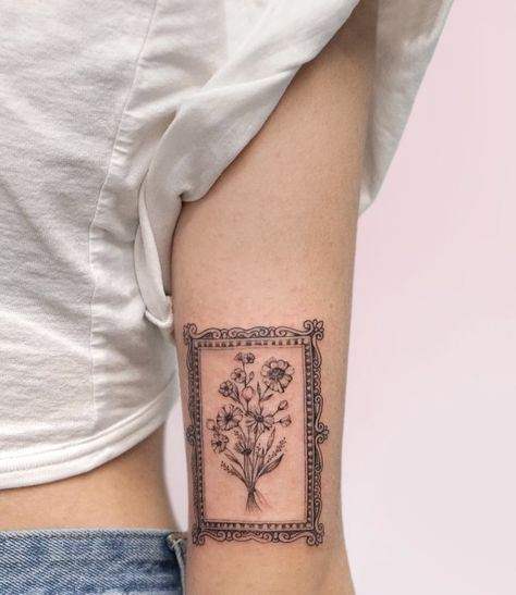 Frames Tattoo Design, Simple Back Of Arm Tattoo, Framed Flowers Tattoo, Unique Women Tattoos Inspiration, Picture Frame Tattoo Design, Vintage Patchwork Tattoo, Simple Vintage Tattoo, Framed Floral Tattoo, Tattoo Picture Frame