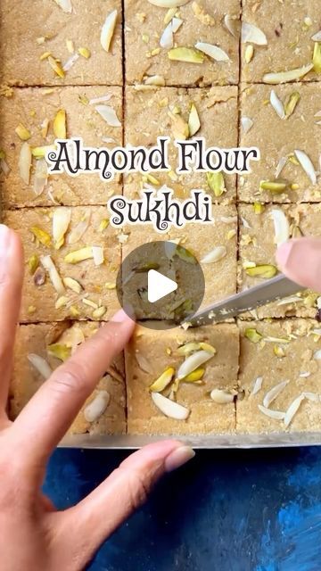 Nidhi Parmar on Instagram: "Almond Flour Sukhdi Recipe | Gol papdi | Gur Papdi : Sukhdi, also called Gur papdi or Gol papdi, is a classic Indian sweet hailing from Gujarat in western India. It’s a delightful treat crafted from simple ingredients like wheat flour, ghee (clarified butter), and jaggery (unrefined sugar). To make it even healthier and gluten-free, I’ve substituted almond flour for wheat flour. Here’s more about almond sukhdi  Ingredients: * 2 cups almond flour * 1 cup ghee * 1 cup jaggery * 1 tsp cardamom powder * Dry fruits for garnish Instructions: * Heat a pan and add 1 cup of ghee to it.  * Once the ghee melts, add 2 cups of almond flour.  * Roast the almond flour in ghee until it turns a golden brown color, stirring continuously to prevent burning. This should take a few Sukhdi Recipe, Diwali Snacks, Gluten Free Scones, Golden Brown Color, Gujarati Food, Gujarati Recipes, Desi Food, Cardamom Powder, Indian Sweet