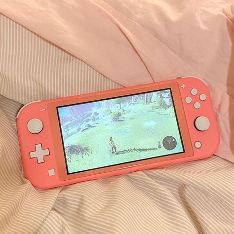 Amazon.com: Nintendo Switch Lite - Coral : Video Games Switch Lite Aesthetic, Console Setup, Pink Nintendo, Nintendo Lite, Nintendo Switch System, Nintendo Switch Case, Nintendo Switch Lite, Video Game Rooms, Nintendo Switch Accessories