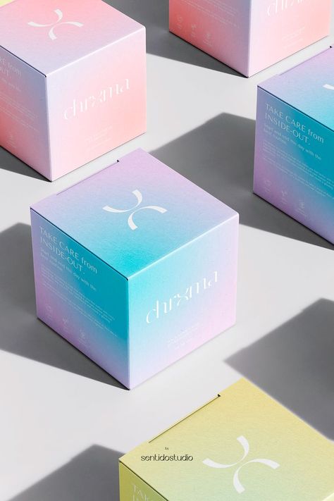 Packaging for Chrxma: a concept skincare & cosmetics brand 🛁 #branddesign #graphicdesign #packagingdesign #gradient #pastel #logo #moisturizer #selfcare Pastel Skincare Packaging, Gradient Box Packaging, Gradient Skincare Packaging, Skin Care Design Ideas, Ethereal Packaging, Pastel Packaging Design, Gold Skincare Packaging, Gradient Packaging Design, Iridescent Packaging