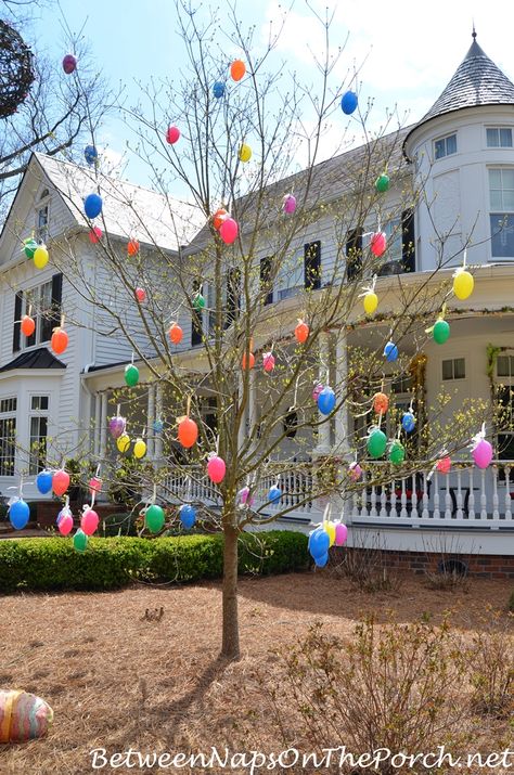 Tree Decorated with Colorful Easter Eggs Diy Osterschmuck, Easter Outdoor, Easter Egg Tree, Plastic Easter Eggs, Easter Bunny Wreath, Easter Decorations Dollar Store, Easter Decorations Outdoor, Easter Decorations Diy Easy, Easter Tree