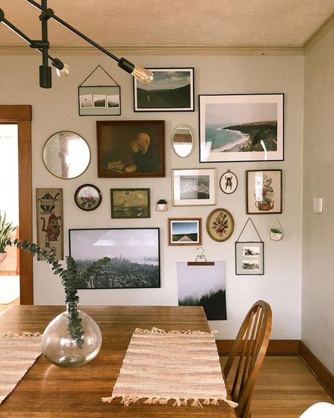 Cara Crawford | Omaha Realtor on Instagram: "LOVE this gallery wall from my ever so talented friend, client, and new homeowner, @andreanuxoll! Gallery walls are such a great way to add personality and texture in your home. We’ve done some in our home to include art from family, travels, concerts, and childhood. What are your favorite pieces on your walls?♥️ P.S. I love her tiny wall planters too! 🌱 #gallerywallinspo #gallerywalls #gallerywalldecor" Friends And Family Gallery Wall, Gallery Wall With Clock, Wall Gallery Ideas, Wall Planters, Gallery Ideas, Gallery Wall Decor, Kitchen Design Decor, Gallery Walls, Travel Wall