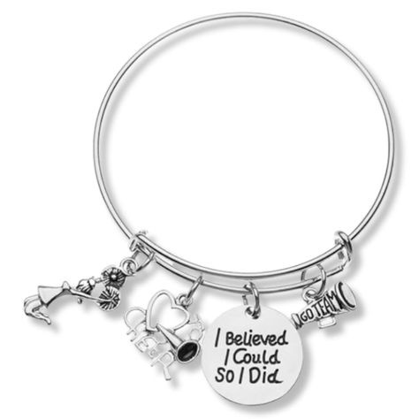 PRICES MAY VARY. CHEER JEWELRY - Motivational "I Believed I Could So I Did"- Adorable Cheer Charm Bracelet for Cheerleaders CHEER BRACELET- Inspirational Silver Plated Cheerleading charms on stainless steel bangle bracelet CHEER BRACELET- Inspirational Silver Plated Cheerleading charms on stainless steel bangle bracelet. Slide open to make bigger, expandable bracelet is easy to take off and put on and will fit most wrist sizes CHEERLEADER GIFTS - Looking for an inexpensive cheer gift to show you Cheer Team Gifts For Competition, Cheer Bracelet, Cheer Gift Bags, Cheer Jewelry, Cheerleader Gifts, Cheerleading Gifts, Cheer Gifts, Cheer Team, Senior Night