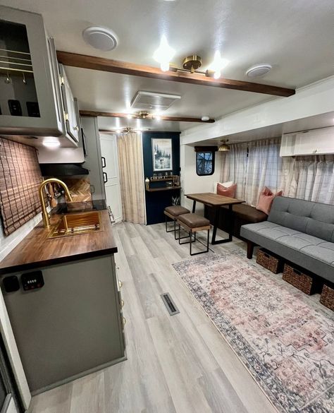 @Drewtayla and her husband bought this RV already renovated and wasted no time getting on the road to travel!⁠ ⁠ The camper is very homey… | Instagram Camper Makeover Dark Cabinets, Rear Living Rv Remodel, Remodel Fifth Wheel Rv Interior, Modern Rv Decor, Remodeled 5th Wheel Rv Interior, Rustic Rv Remodel, Rv Renovation Ideas 5th Wheels, Living In A Camper Full Time, Old Camper Remodels