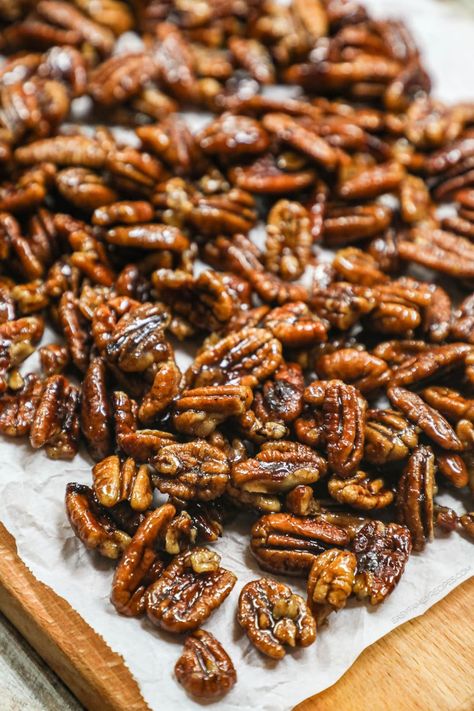 These Sweet and Spicy Pecans are perfect for snacking or for adding texture and flavor to any recipe! These spicy candied pecans are tossed in butter and sweet spices, then coated in a maple, orange, and brown sugar. Serve these spicy pecans recipe as a snack or sprinkle over mashed potatoes, baked brie, roasted veggies, or even your favorite cereal. These sweet and spicy pecans with brown sugar won't last long! Sweet And Spicy Mixed Nuts Recipe, Spicy Candied Pecans Recipe, Hungryroot Recipes, Spicy Pecans Recipe, Spicy Candied Pecans, Sweet And Spicy Pecans, Spicy Pecans, Spicy Nuts, Potatoes Baked