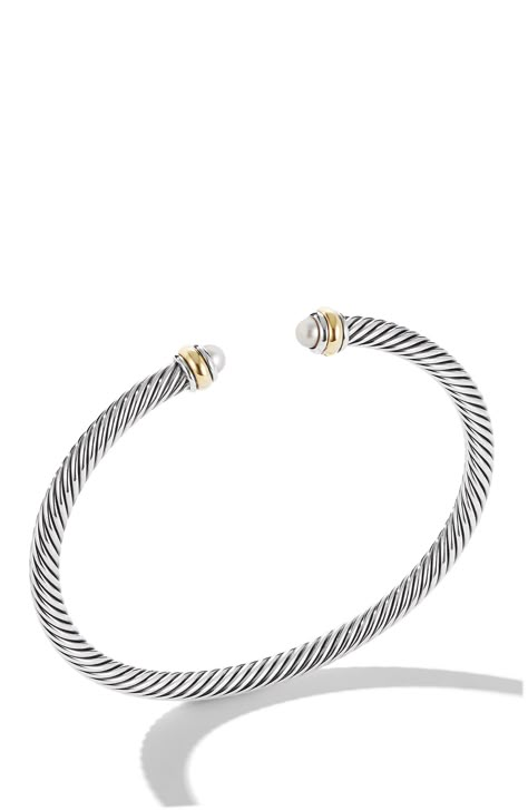 A cable spiral brings signature texture to an Italian-crafted cuff bracelet made from sterling silver and detailed with 14-karat gold and pearl endcaps. 1/8" width Sterling silver/18k gold/freshwater pearl Made in Italy David Yurman Chain Bracelet, Enewton Silver Bracelets, Classy Jewelry Silver, Julie James, Gold And Pearls, David Yurman Bracelet, Preppy Jewelry, Cable Bracelets, Jewelry Lookbook