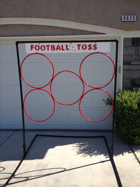 Football Toss school carnival game. Frame made out of pvc pipe and the rings are hoola hoops zip tied to frame. The kids loved it! Carnival Games Halloween Theme, Carnival Party Games Diy, Town Festival Ideas, School Carnival Booth Ideas, Easter Carnival Games, Diy Carnival Games For Kids, Carnival Games Diy, Cheap Carnival Games, Fall Festival Ideas