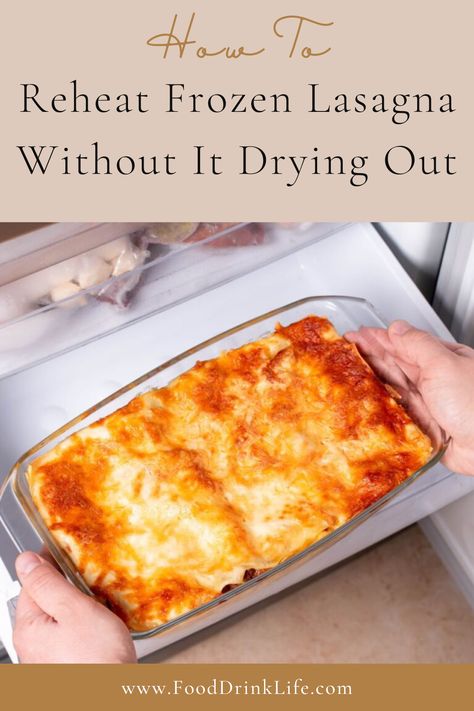 A tray of lasagna being taken out of a freezer. Reheating Frozen Lasagna In Oven, Reheat Lasagna In Oven, Reheating Lasagna In Oven, Frozen Lasagna How Long To Cook, Meals You Can Freeze And Reheat, How To Freeze Lasagna, Reheating Lasagna, Meals You Can Freeze, Leftover Lasagna