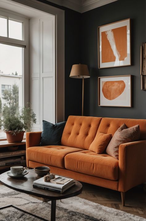 Orange Couch Living Room Mid Century Leather Sofa Living Room, Dark Green Walls Orange Sofa, Living Room Burnt Orange Couch, Rust Couch Decor, Snug Ideas Family Rooms, Terracotta Sofa Living Room Ideas, Cinnamon Couch Living Room, Dark Orange Couch, Rust Sofa Living Room Color Schemes