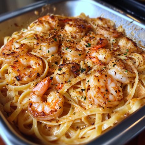 Shrimp Scampi Linguine is a classic dish that combines juicy, tender shrimp with al dente pasta in a garlic-butter sauce infused with white wine, lemon, and fresh herbs. This copycat ... Read more Shrimp Pasta Wine Sauce, Shrimp And Crab Scampi Pasta, White Wine Shrimp Pasta, Wine Sauce Pasta, Shrimp And Scallop Scampi, Cheesecake Factory Shrimp Scampi, Seafood Pasta White Wine, White Wine Pasta, Shrimp Scampi Linguine