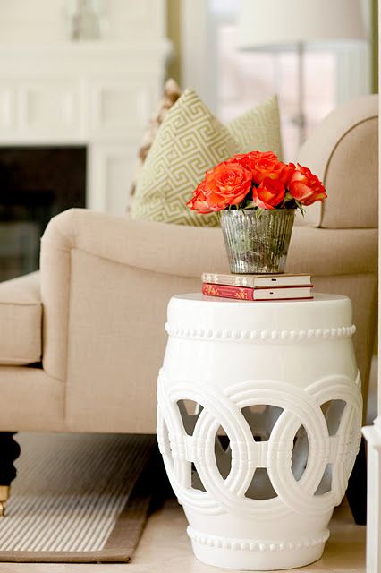 absolutely love this garden stool side table. Click link to view whole room  i also love how the coral of the flowers looks against the white of the table White Accent Table, Garden Stool, A Living Room, Decoration Design, Home Decor Inspiration, End Table, Home Interior, Home Living Room, Room Inspiration