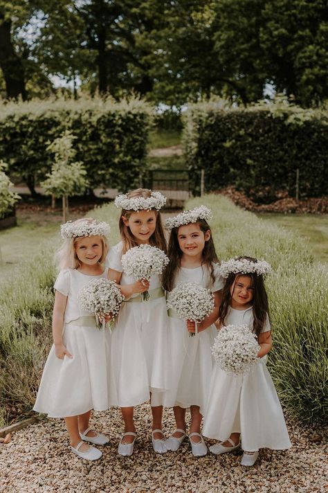 Four flower girls in white dresses and white ballet shoes with small round gypsophila bouquets with matching gypsophila flower crowns Ghost Wedding, Kids Bridesmaid Dress, Gypsophila Bouquet, Gypsophila Wedding, Flower Girl Bouquet, Flower Girl Crown, White Flower Girl Dresses, Wedding Dresses For Girls, Cute Wedding Ideas