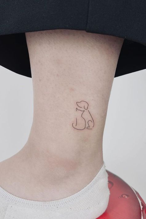 Cat Dog Tattoo Minimalist Small Tattoos For Pets, Cat And Dog Line Tattoo, Tattoos For Your Cat, Small Dog Tattoos For Women, Mini Cat Tattoo, Dog Minimalist Tattoo, Cat Finger Tattoo, Simple Animal Tattoos, Dog Tattoo Ideas Minimalist