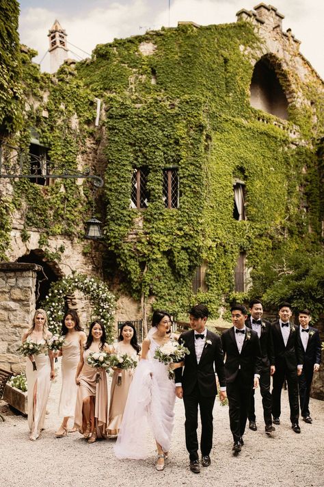 Bride in a white wedding dress with the groom and groomsmen in black tie and bridesmaids in champagne gold dresses for La Baronia castle outdoor wedding La Baronia Wedding, Italian Black Tie Wedding, Black Tie Italian Wedding, Garden Black Tie Wedding, Italian Wedding Bridesmaids Dresses, Black Tie Wedding Aesthetic, Black Tie Groomsmen, Champagne And Black Wedding, Black Tie Garden Wedding