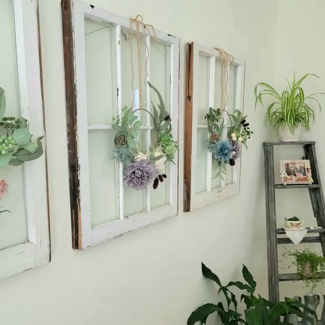 These repurposed old windows can add a touch of charm and character to the space. The peeling paint and worn edges create a unique, rustic look that adds a sense of history and nostalgia to your home. They look great with simple wreaths, making them so beautiful as a unique wall hanging. Vintage window decor from @bebefinihome Upcycled Old Windows, Windows As Wall Decor, Vintage Windows Repurposed, Decorating With Old Windows, Vintage Wall Decor Ideas, Vintage Window Decor, Simple Wreaths, Repurposed Windows, Add Character To Your Home