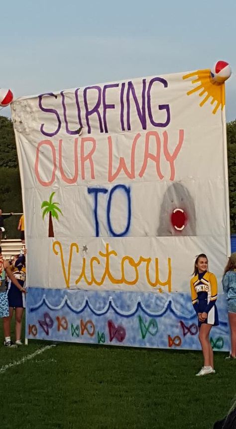 Beach Theme Run Thur Beach Cheer Theme, Homecoming Float Ideas Theme, Homecoming Float Themes Ideas, Beach Themed Football Signs, Beach Theme Run Through Sign Football, Beach Theme School Spirit, Beach Homecoming Float, Disney Pep Rally Ideas, Hawaiian Run Through Signs Football