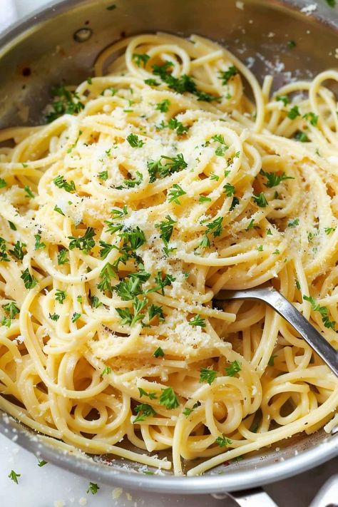 This quick and easy garlic Parmesan pasta combines tender spaghetti with a rich, cheesy sauce for a comforting meal ready in minutes. Perfect for busy weeknights! Garlic Linguine Recipes, Clear Pasta Sauce, Cheesy Garlic Pasta Recipes, Clear Sauce For Pasta, Spaghetti Al Limone Recipe, Spaghetti Without Red Sauce, Pasta Recipes Without Cream, Quick Sauce For Pasta, Garlic Parm Spaghetti