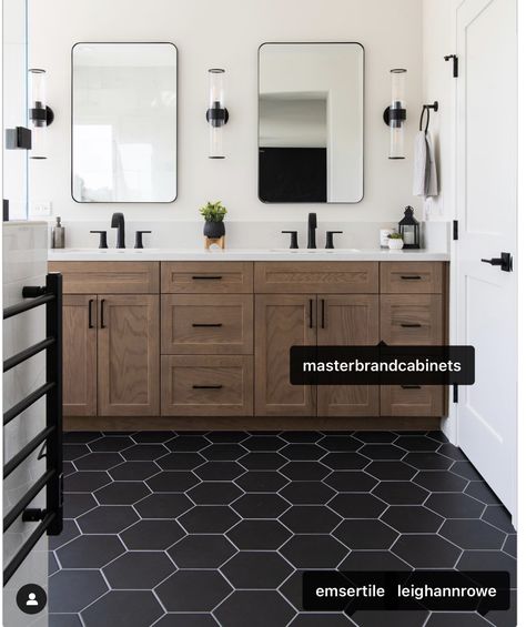 Master Bath With Dark Floors, Dark Hex Tile Bathroom, Dark Tile Floor Bathroom Wood Vanity, Black Tile Bathroom Floor Wood Vanity, Black Hexagon Tile Bathroom Floor, Moody Master Bath, Black Hexagon Tile Bathroom Floor With Wood Vanity, Masculine Bathroom Ideas, Black Honeycomb Tile Bathroom Floor