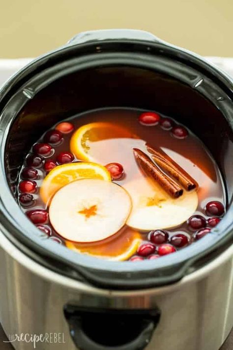 The perfect holiday drink, this Slow Cooker Cranberry Apple Cider is made with apple, cranberry and orange juices! Perfect for your Thanksgiving or Christmas party. Christmas Apple Cider, Cranberry Apple Cider, Hot Apple Cider Recipe, Slow Cooker Apple Cider, Cranberry Cider, Cranberry Drinks, Apple Cider Recipe, Winter Celebration, Cranberry Apple