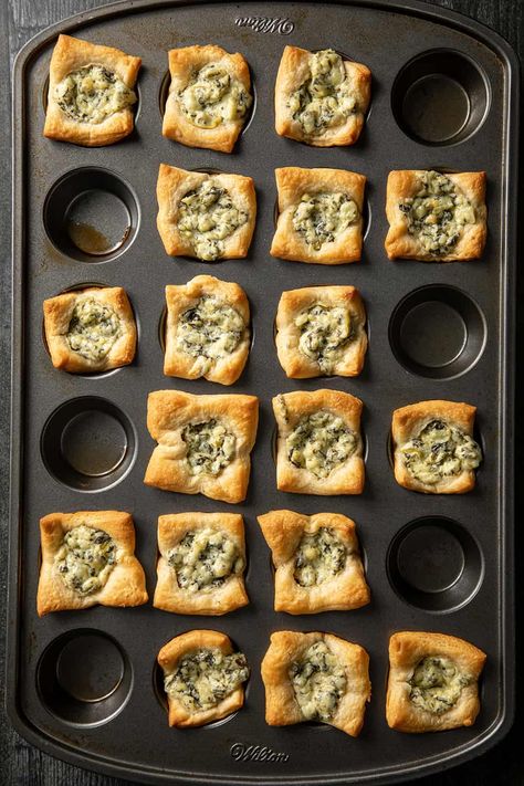 Spinach Artichoke Bites use just two ingredients to make an incredibly easy appetizer! These bites are perfect for a holiday party or even adding to a game-day spread. Crescent Dough Sheet Recipes, Crescent Roll Recipes Appetizers, Spinach Artichoke Recipes, Crescent Sausage Bites, Spinach Artichoke Bites, Artichoke Bites, Easy Crescent Roll Recipes, Artichoke Appetizer, Spinach Bites