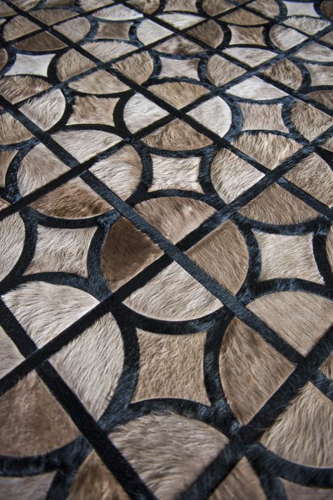 Rewind pattern cowhide rug shown in barley & ink #cowhide #rug Steampunk Rooms, Design Fabric Textiles, Cowhide Decor, Leather Rugs, Patchwork Cowhide Rug, Fur Carpet, Tooled Leather Bag, Leather Rug, Leather Pillow