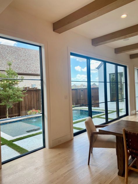 Open concept with pool view Pool View From Living Room, Living Room With Pool View, Modern Living Area, Three Story House, Impact Windows, Pool View, Open Dining Room, Patio Landscaping, Home Office Setup