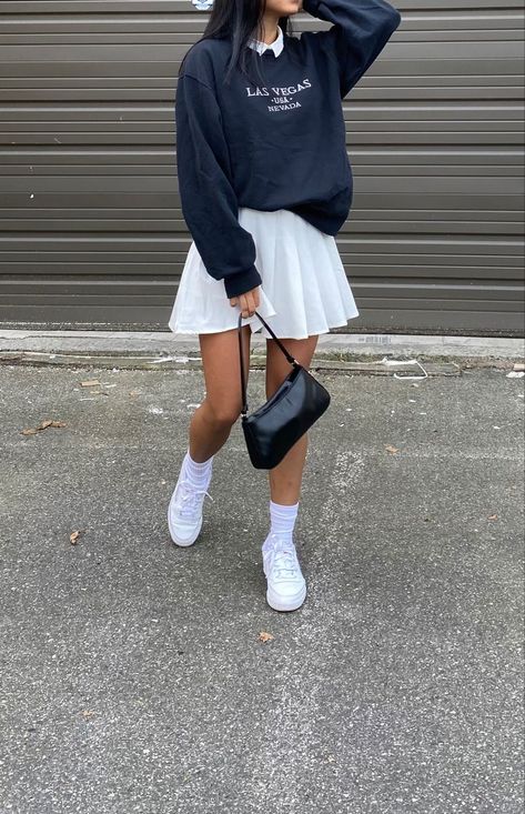 Skirt With A Sweater Outfit, White School Skirt Outfit, Skirts And Crewnecks, Sweater With Tennis Skirt, Skirt With Baggy Sweater, Baggy Jumper And Skirt, Sweater And Tennis Skirt Outfit, White Sneakers Skirt Outfit, Sweatshirts And Skirts Outfit