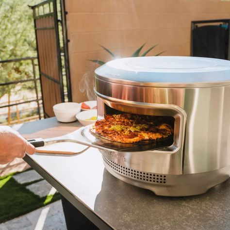 12 of the Best Outdoor Pizza Ovens 2022 | Taste of Home Pizza Oven Outside, Pizza Cooker, Best Outdoor Pizza Oven, Backyard Pizza Oven, Stainless Steel Fire Pit, Solo Stove, Pizza Chef, Outdoor Pizza Oven, Pizza Oven Outdoor