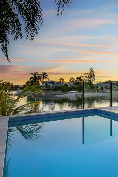 tranquil pool with canal view at sunset Gold Coast Mansion, Gold Coast House, Brisbane House, Australia Life, Brand Aesthetic, Coastal Beach House, Canal House, Luxury Pools, Two Storey House