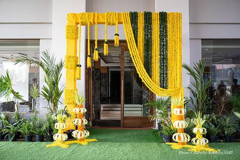 Decor wedding decor Indian wedding wedding planning color scheme pastel decor indian wedding decor color scheme floral decor indian decor wedding flowers wedding ideas decor ideas indian wedding planning Traditional Flower Decoration Indian, Haldi Gate Decoration, Gate Decoration For Diwali, Engagement Decor Indian, Entrance Door Flower Decoration Indian, Genda Flower Decoration, Flower Gate Decoration Wedding, Door Decoration For Wedding, Wedding Gate Decoration Indian